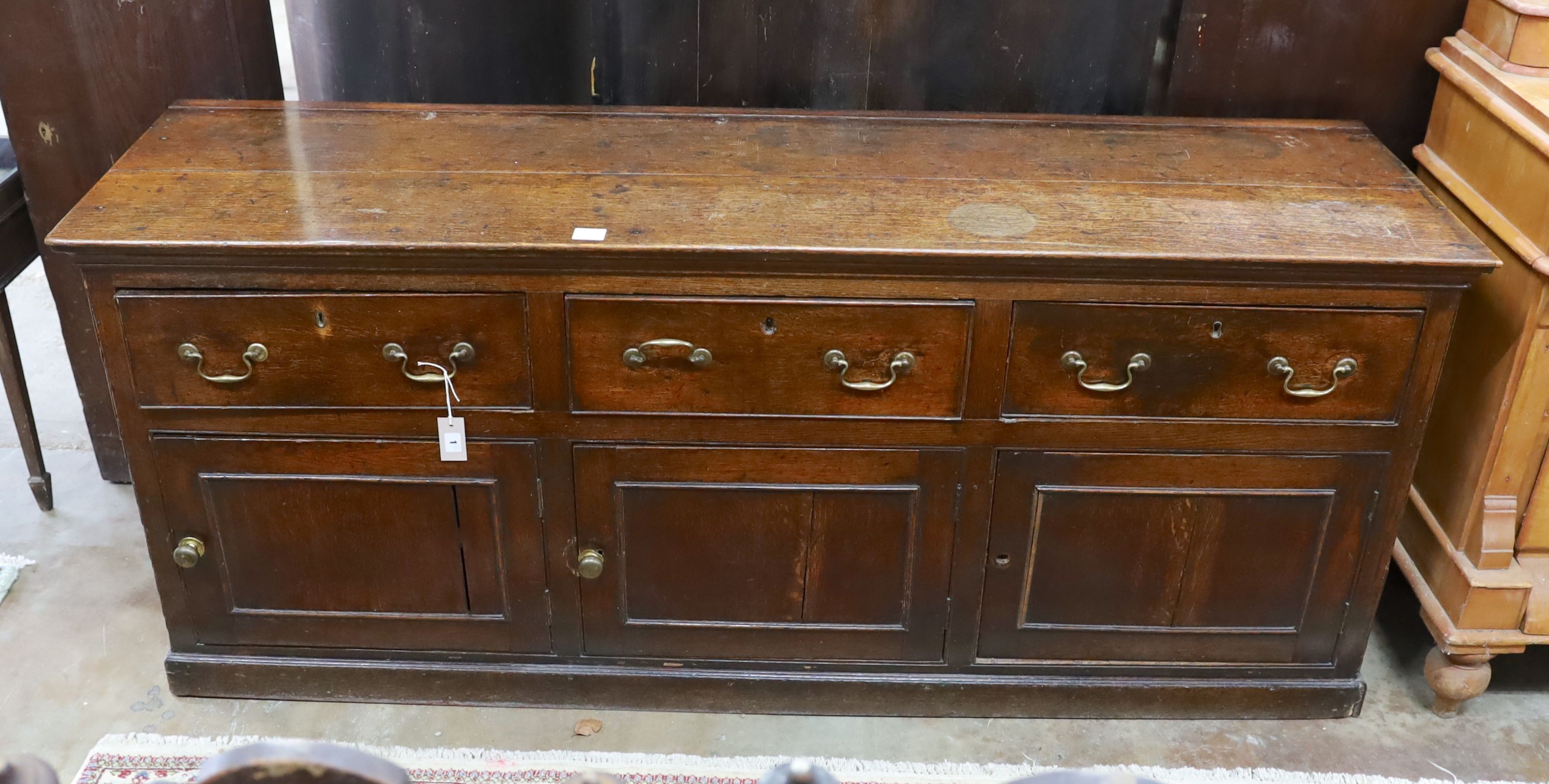 An 18th century oak dresser base, length 189cm, depth 53cm, height 79cm